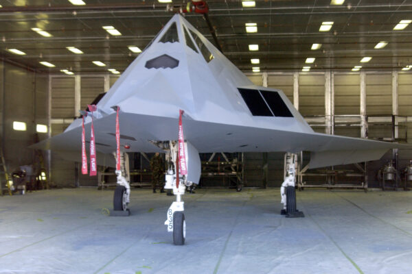 HOLLOMAN AIR FORCE BASE, N.M. -- An F-117 Nighthawk sits in its hangar after being repainted.  The aircraft, owned by the 53rd Test and Evaluation Group's Detachment 1 here, was repainted gray as part of a test to determine whether the F-117 can have a role in daytime combat operations.  Normally painted black, the stealth fighters are used for night missions.  (U.S. Air Force photo by Airman 1st Class Vanessa LaBoy)